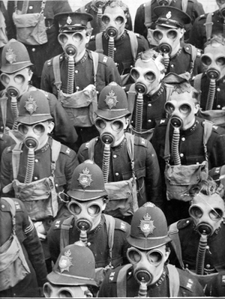 police wearing gas masks