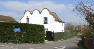 Dutch-style roof on house on Green Man Lane, Kirstead Green, Norfolk. Licensed under the Creative Commons Attribution-Share Alike 2.0 Generic license.