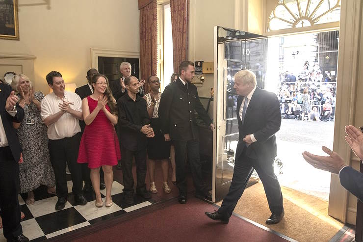 Boris Johnson enters No 10 Downing Street as the new Prime Minister.