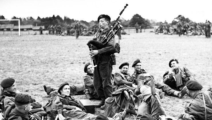 Bill Millin playing his bagpipes on the third of June 1944