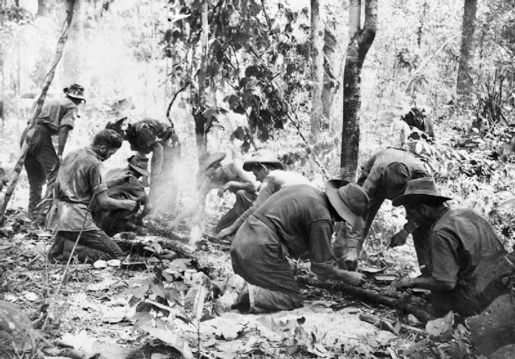 Chindits making tea at their jungle bivouac. WC.
