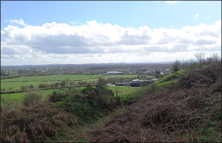 Atop the ramparts of Old Oswestry looking East into Shropshire and Cheshire, with the Peckforton Hills in the distance. Photo by Mike Edwardson.