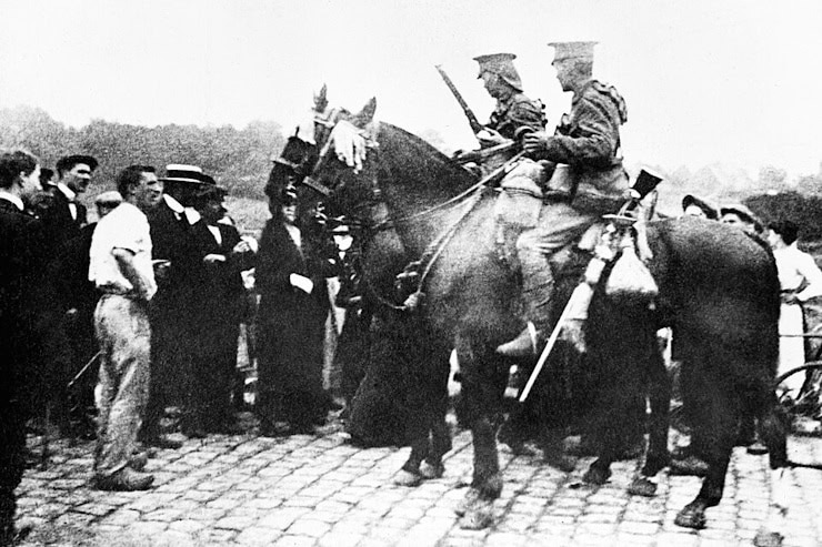 A patrol of the 18th Hussars attempting to obtain information from the local population, 21 August 1914, Imperial War Museums. WC.PD.