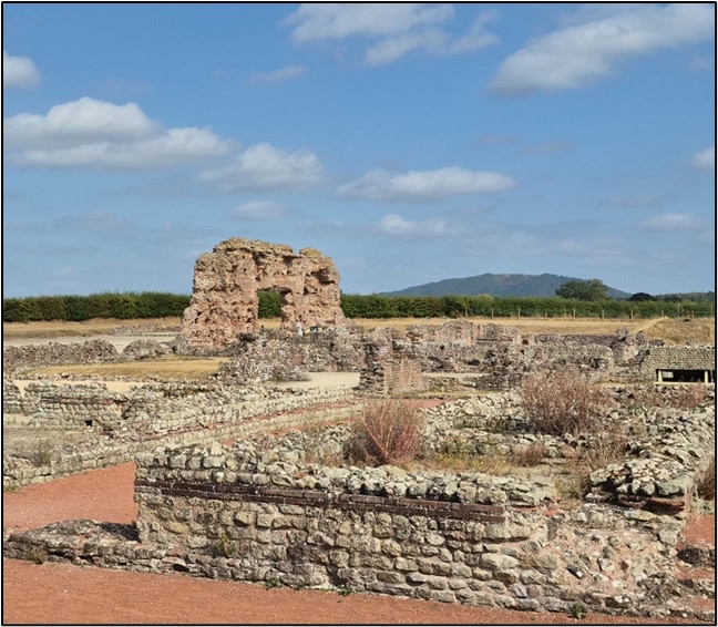 The foundations of the bathhouse, with the Wrekin in the background. Photo by Mike Edwardson.