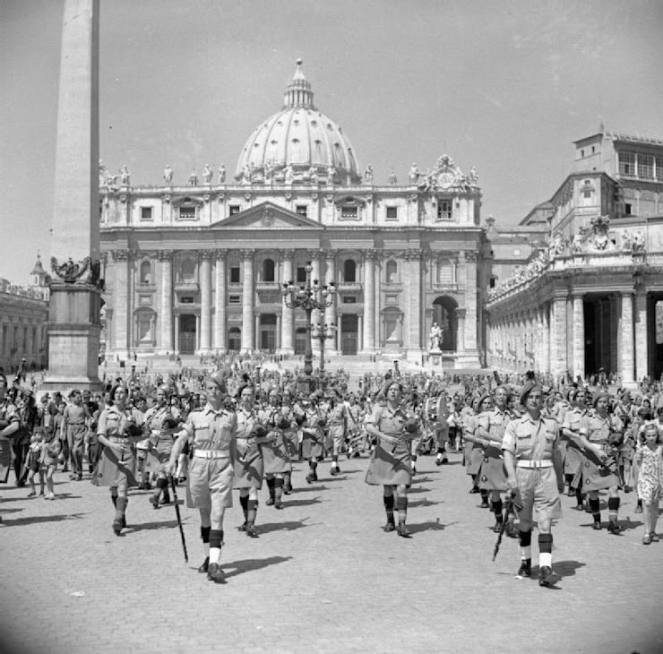 The band of the Irish Brigade plays in front of St Peter's Church in the Vatican City, Rome, 12 June 1944.. WC PD