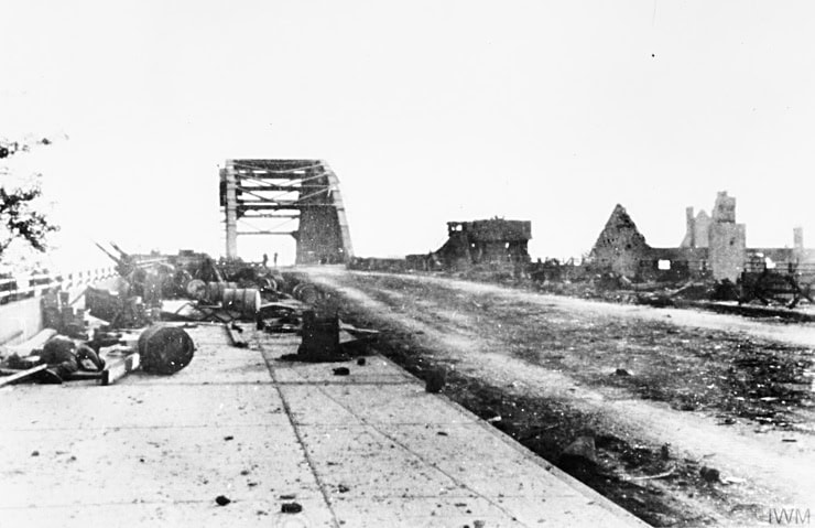 The vital bridge at Arnhem after the British paratroopers had been driven back, September 1944. WC PD.